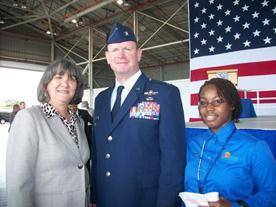 Lesly Diaz poses with Incoming Commander Colonel Christian G. Funk and Ishikeeba McLeod