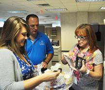 Employees from each floor were invited to purchase goodies during the walking bake sale. Special Olympics athlete Kyle Gathof was on hand to encourage employees to indulge in something sweet for SOKY.