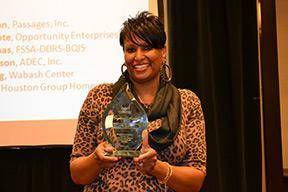 Direct Support Professional Lettie Gentry accepts Indiana Association of Rehabilitation Facilities’ (INARF’s) Keystone Award for outstanding service to people with disabilities.