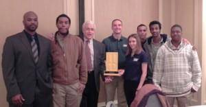 Pictured from left are Career Development Services System Counselor Roderick Farmer; student Shawn Townsend; Business and Community Liaison John Mastroianni; Facility Maintenance Instructor Sean Kelly; and students Autumn Morgan, Kohn Keltner, Yafet Degefu and Antonio Logan. All were recognized for their community service when they received the Volunteer Group of the Year award from the United Way of Central Virginia, bringing to light their passion for service.