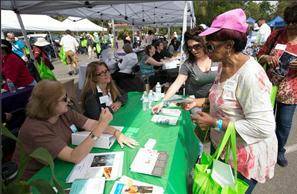 Ms. Klock distributed business cards to guests, helping spread the word about ResCare HomeCare services.