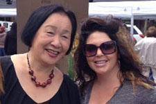 Director of Business Development Natalie Klock, right, met Oakland Mayor Jean Quan at the 11th annual Healthy Living Festival, which attracts 2,000 seniors from the local area.