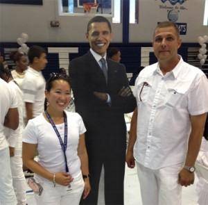 Edison Job Corps staff members Jenny Wang and Csaba Rusk pose with a cardboard cutout of President Barack Obama at the EJCC “All White Affair” to celebrate Job Corps 50th Anniversary.