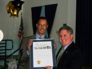 Frank Balzebre, right, Office of Miami-Dade County Mayor Carlos Gimenez, presents Proclamation to Luis Cerezo, HJCC Center Director.
