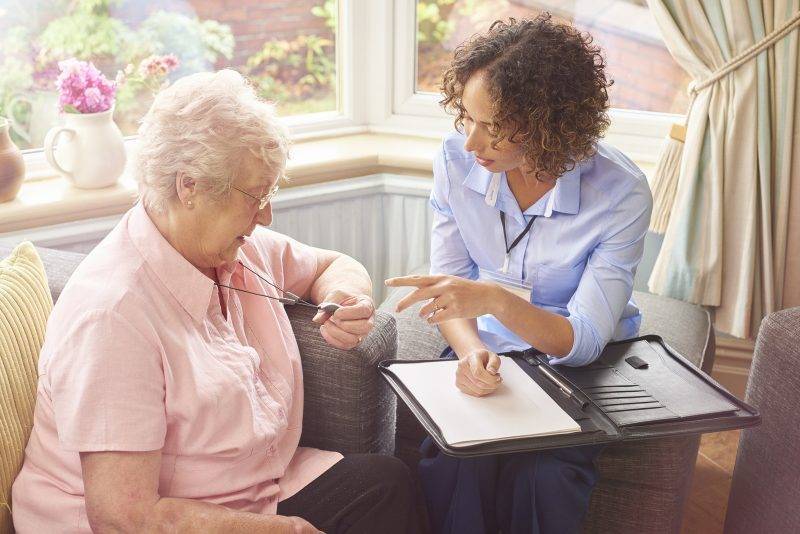 caregiver talking with patient