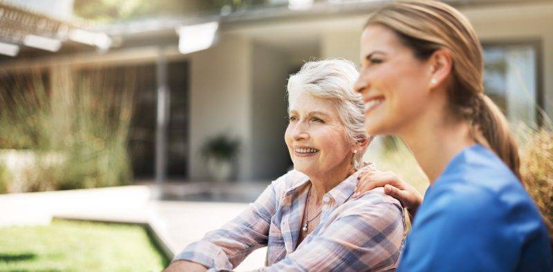 caregiver and patient smiling