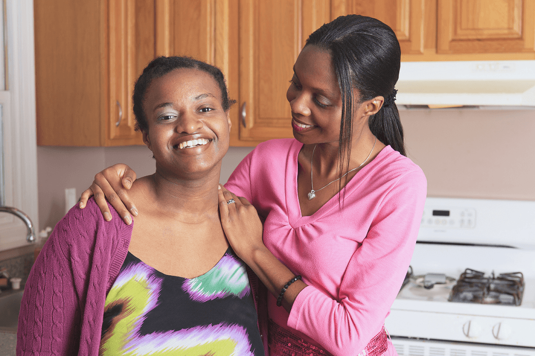 caregiver with special needs woman